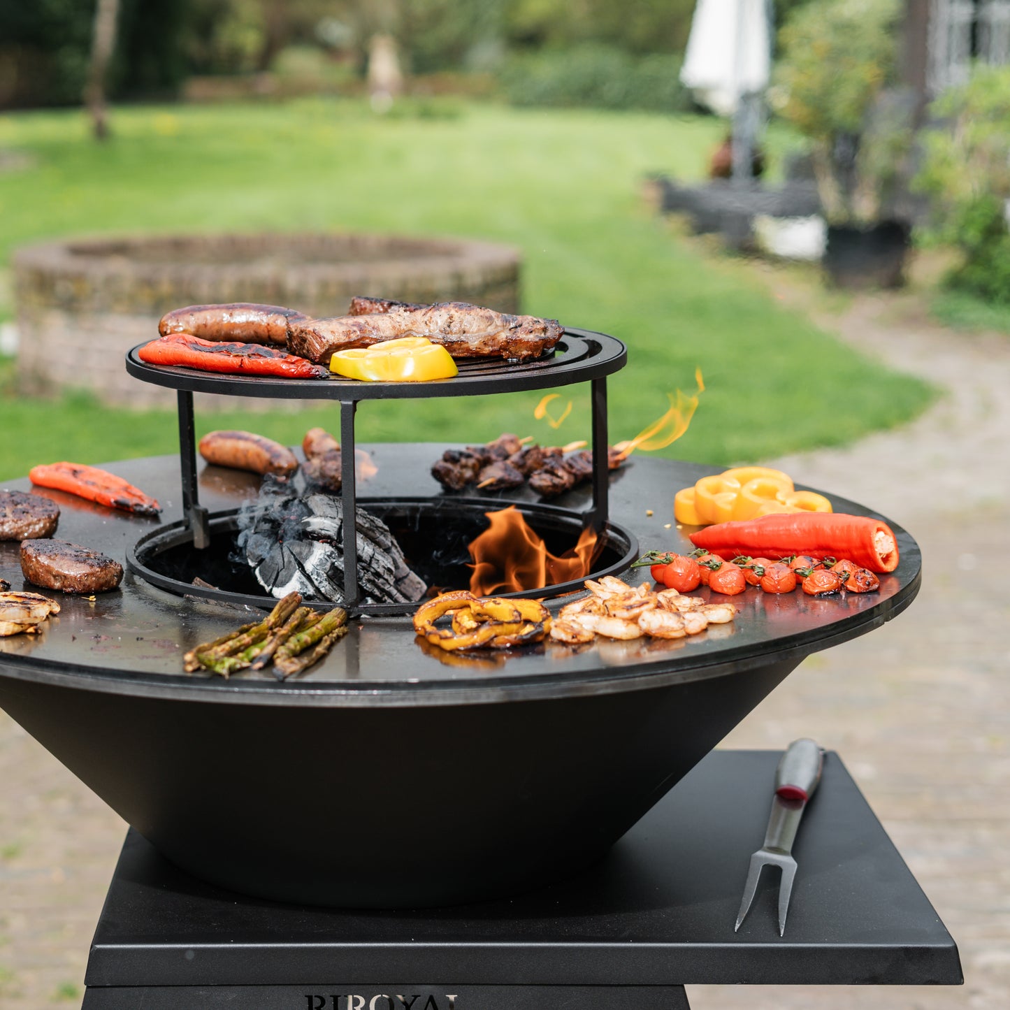 Brasero BBQ Plancha Grill Compañero XXL Blackline - Con tapa y depósito de leña Ø80cm