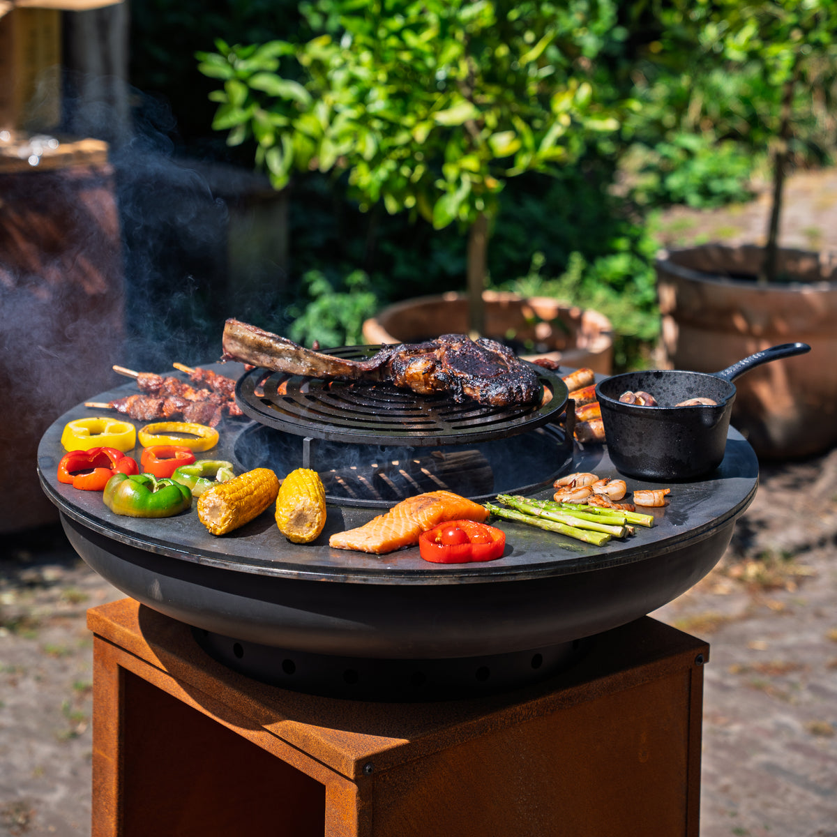 BBQ Plancha Grill Hermano XXL Blackline Acero Corten - Con atizador y almacén de leña Ø80cm 8mm