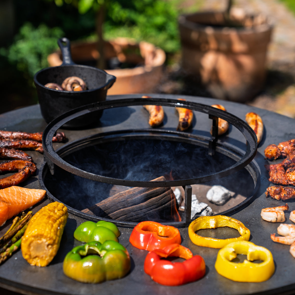 Barbacoa Plancha Grill Hermano XXL Acero Corten Blackline - Con atizador y leñero Ø80cm 8mm