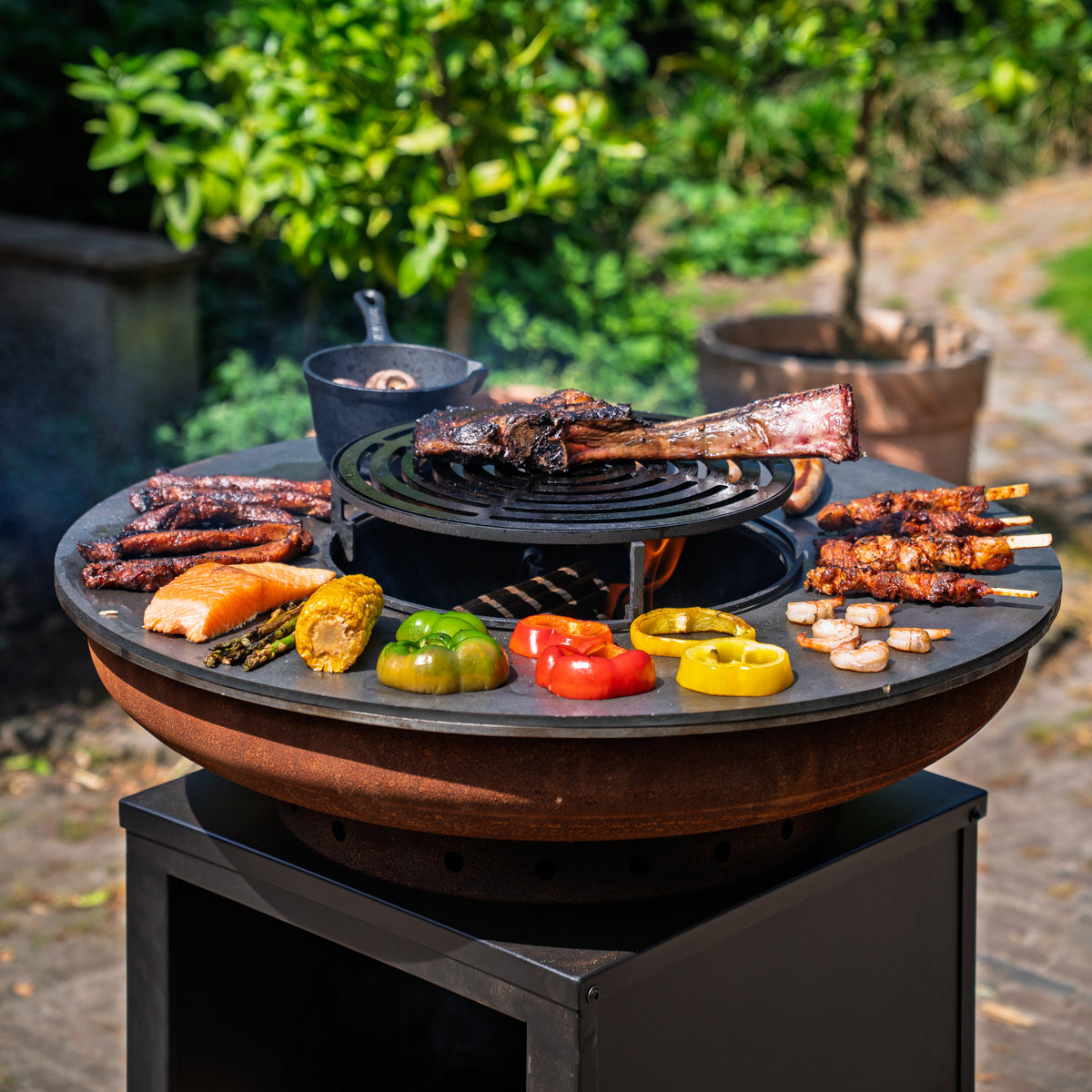 Barbacoa Plancha Grill Hermano XXL Acero Corten Blackline - Con atizador y leñero Ø80cm 8mm