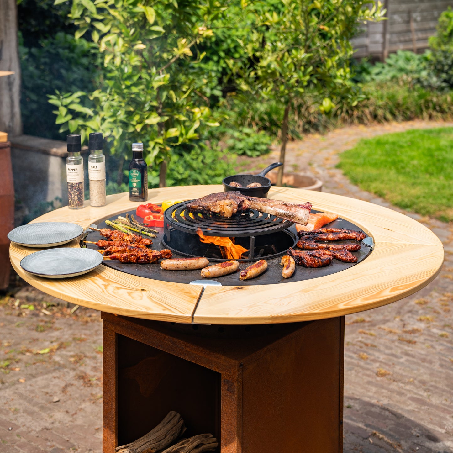 Barbacoa Plancha Grill Hermano XXL Acero Corten - Ø80cm 8mm con Borde de Madera Mesa