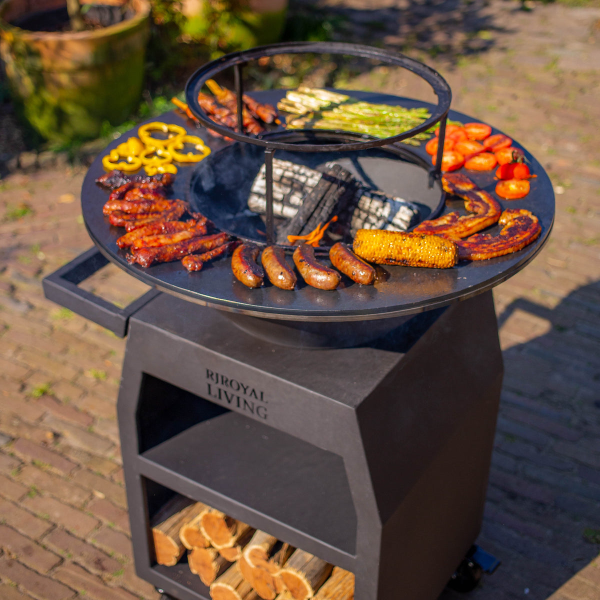 BBQ Plancha Grill Maestro Ø70cm Blackline - Con ruedas grandes y almacén de leña