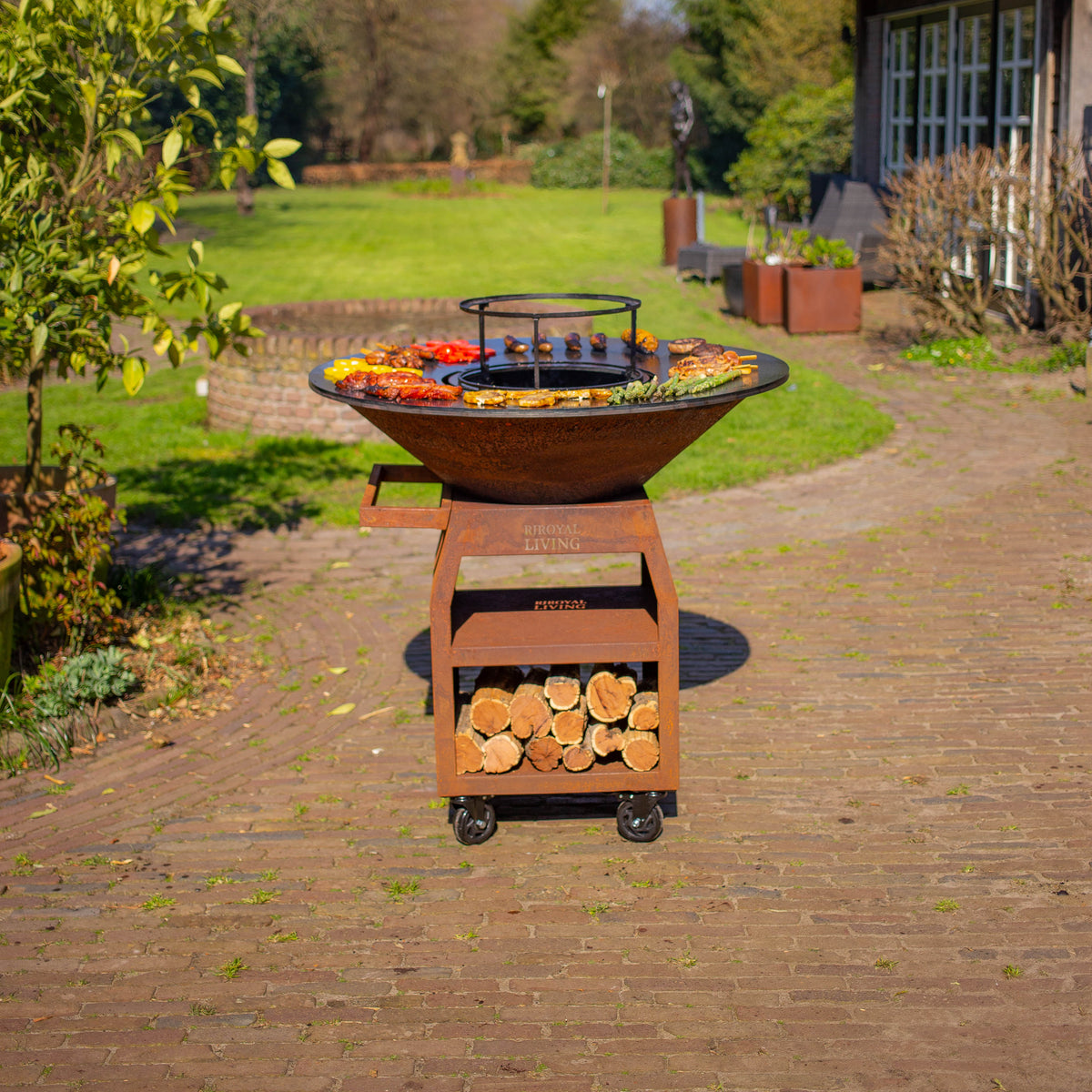 Barbacoa Plancha Grill Maestro XXXL Ø100cm Acero Corten - Con ruedas grandes y almacén de leña