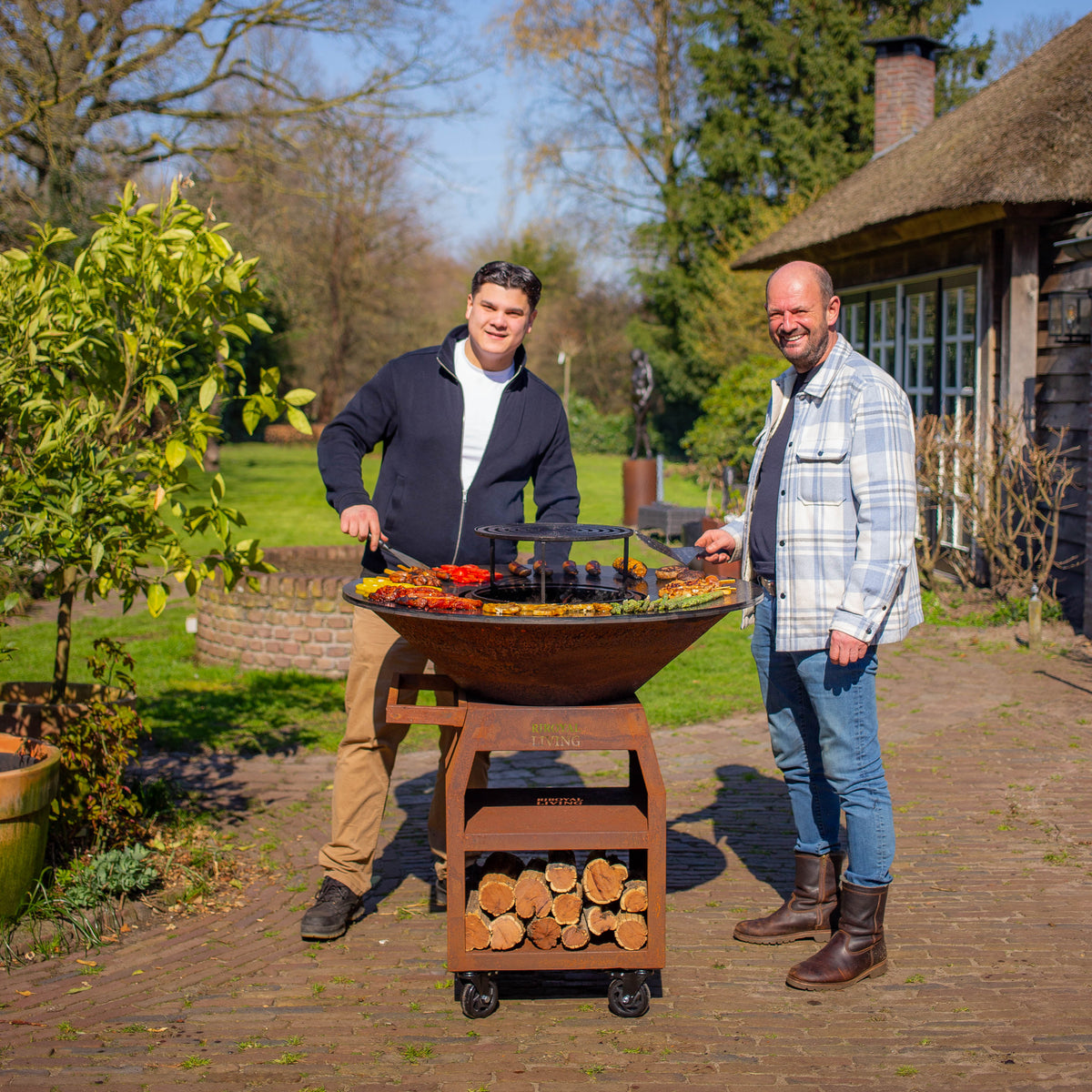 Barbacoa Plancha Grill Maestro XXXL Ø100cm Acero Corten - Con ruedas grandes y almacén de leña