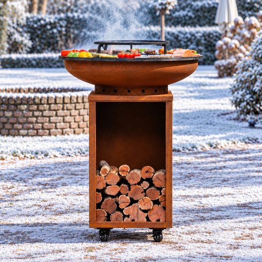 RJRoyal Living Camarada 2.0 70 cm volledig Cortenstaal in besneeuwde tuin